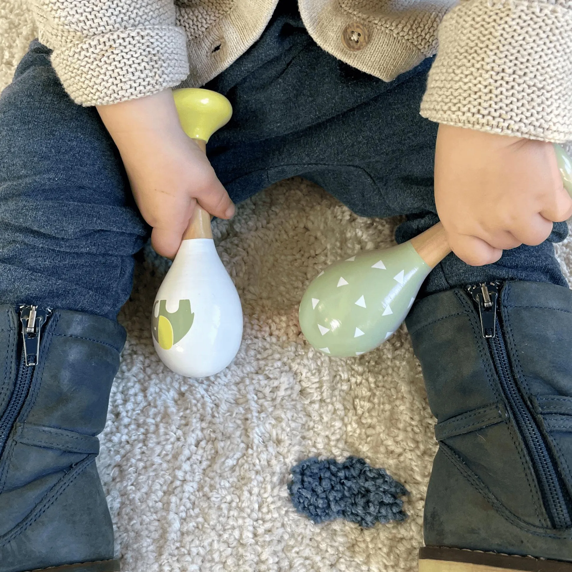 Rasseln Elefant und Dreiecke